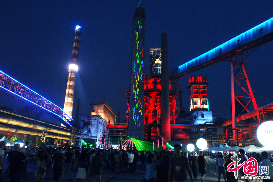 The INTRO 2013 Beijing Electronic Music Festival was held at the Capital STeel factory (首钢| Shougang in Chinese), Beijing, on May 25, 2013. The festival featured 50 Artists and attracted 10,000 people to its 50,000 sqm open-air venue. Image courtesy of China.org.cn